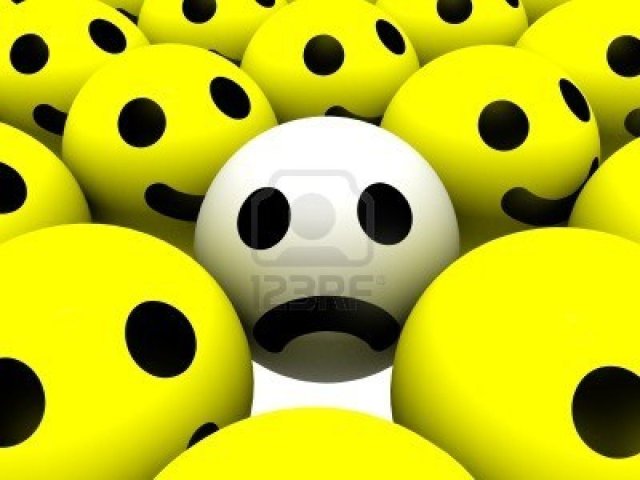 4224585-smiley-with-sad-face-surrounded-by-ones-with-happy-faces